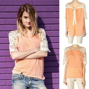 Coral blouse crochet sleeves tie back detail